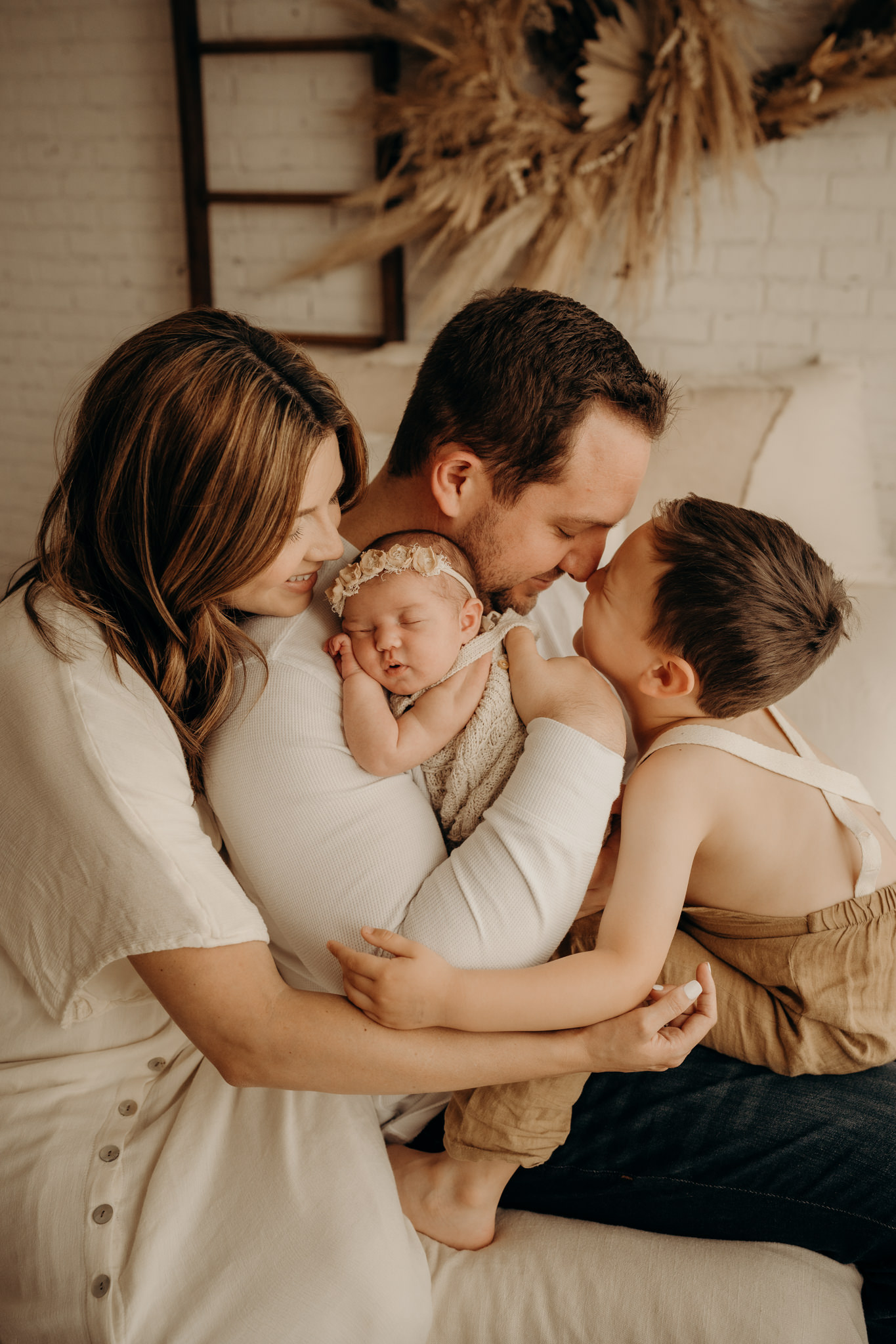 Dallas, Texas newborn photographer capturing the true emotion and joy welcoming a new baby into the world.